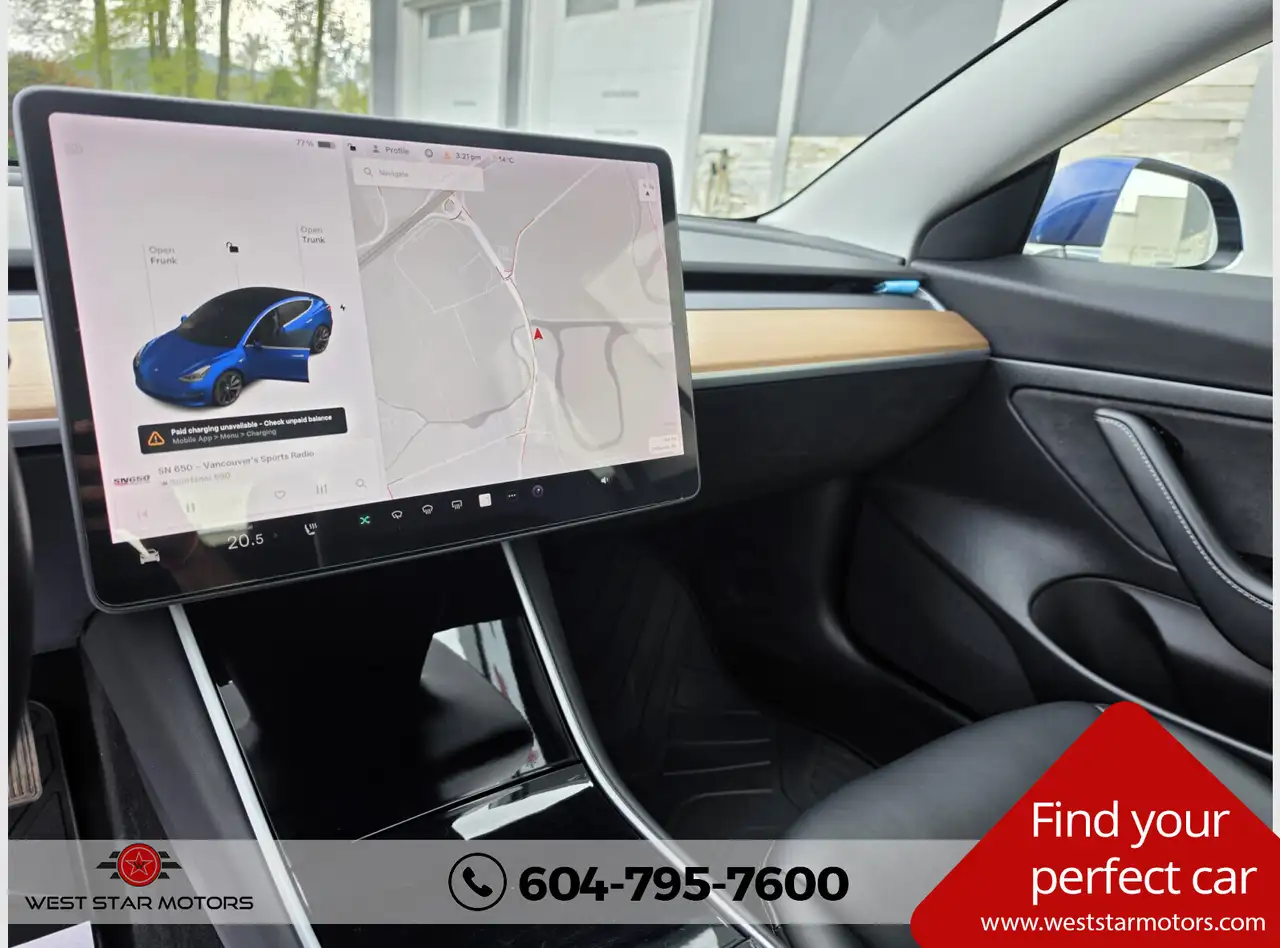 Tesla Model 3 photo Tesla Model 3