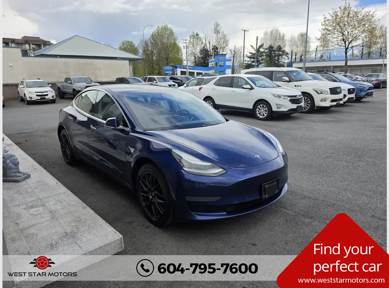 Tesla Model 3 photo Tesla Model 3