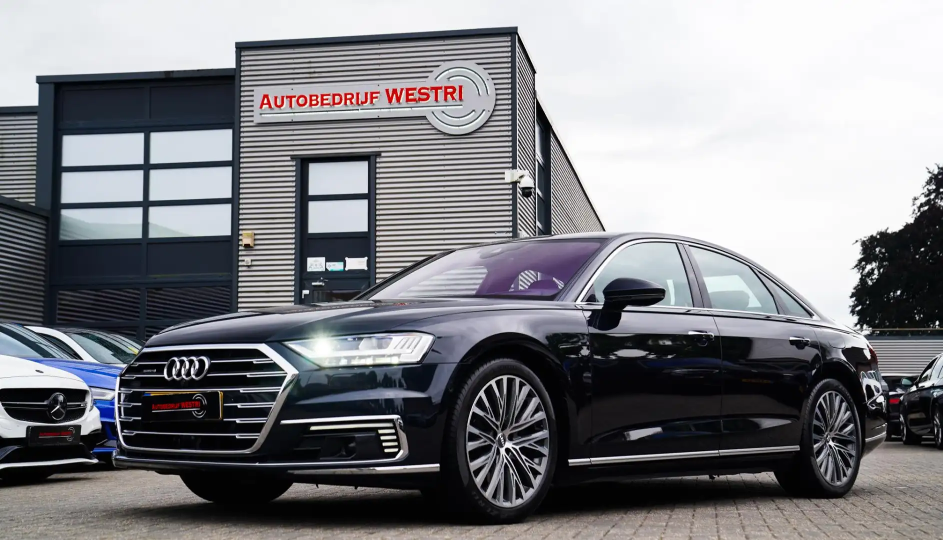 Audi A8 60 TFSI e quattro Pro Line Plus | Massage | Achter Blauw - 1