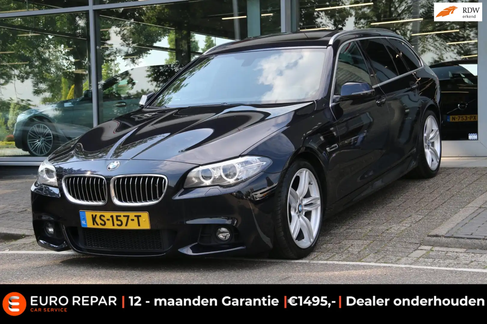 BMW 520 5-serie Touring 520i M-SPORT DEALER OND. NL-AUTO N Zwart - 1