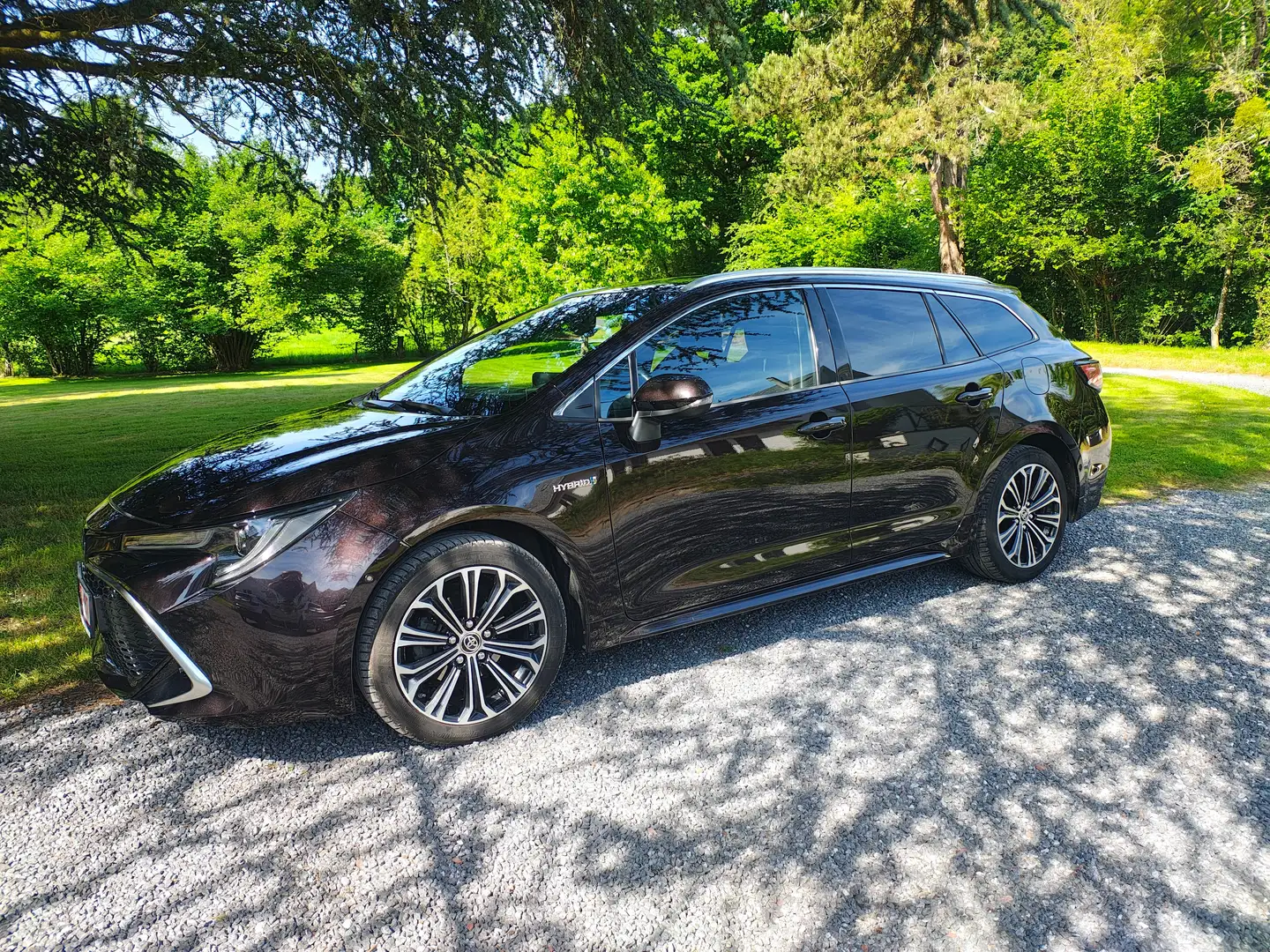Toyota Corolla Corolla SW Hybrid 1.8 Premium GPF e-CVT Bruin - 1