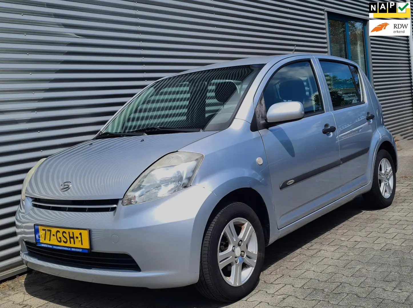Daihatsu Sirion 2 1.0-12V Premium 5drs 09-2008 Grijs Metallic Szürke - 1
