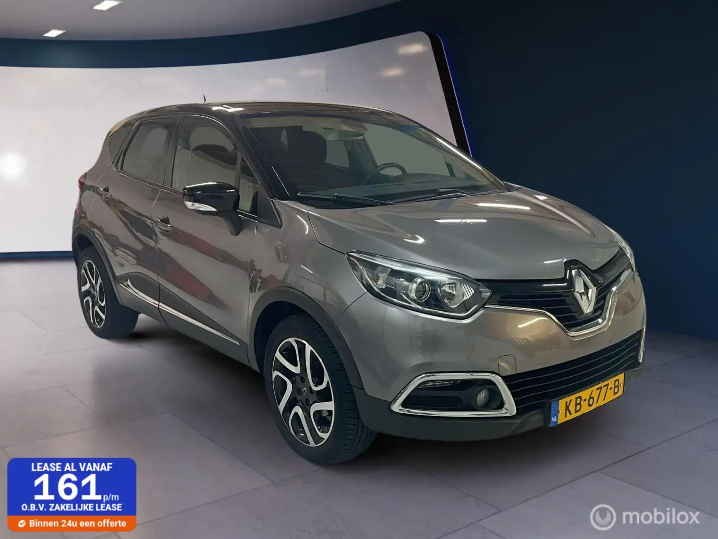 Renault Captur 0.9 TCe Dynamique ✓PDC✓Camera✓Navi✓Cruise Grijs - 1