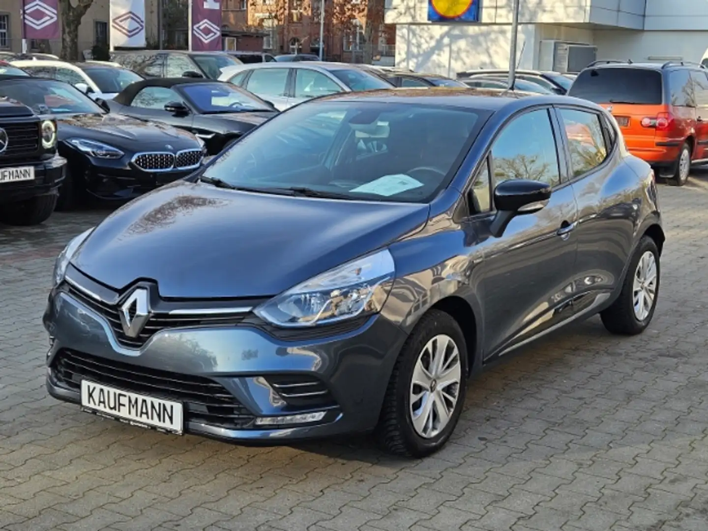 Renault Clio IV Limited Navi Klimaautom SHZ Temp Tel.-Vorb. PDC Grijs - 1