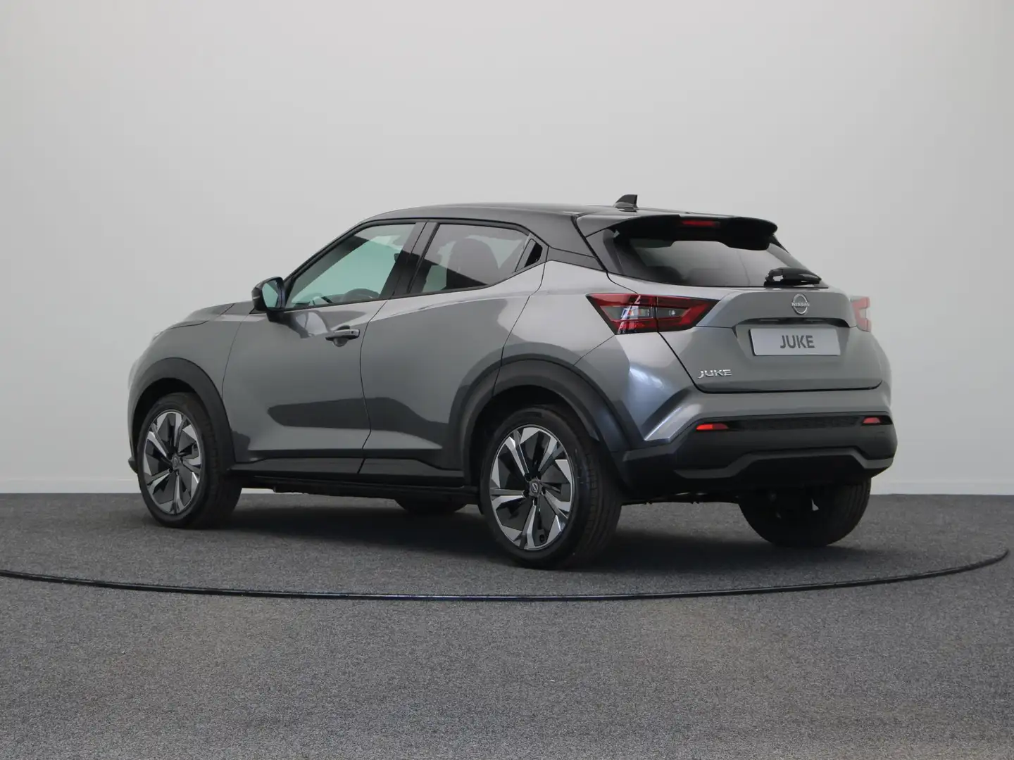 Nissan Juke 1.0 DIG-T Tekna | Bose Audio | Draadloze Oplader | Grijs - 2
