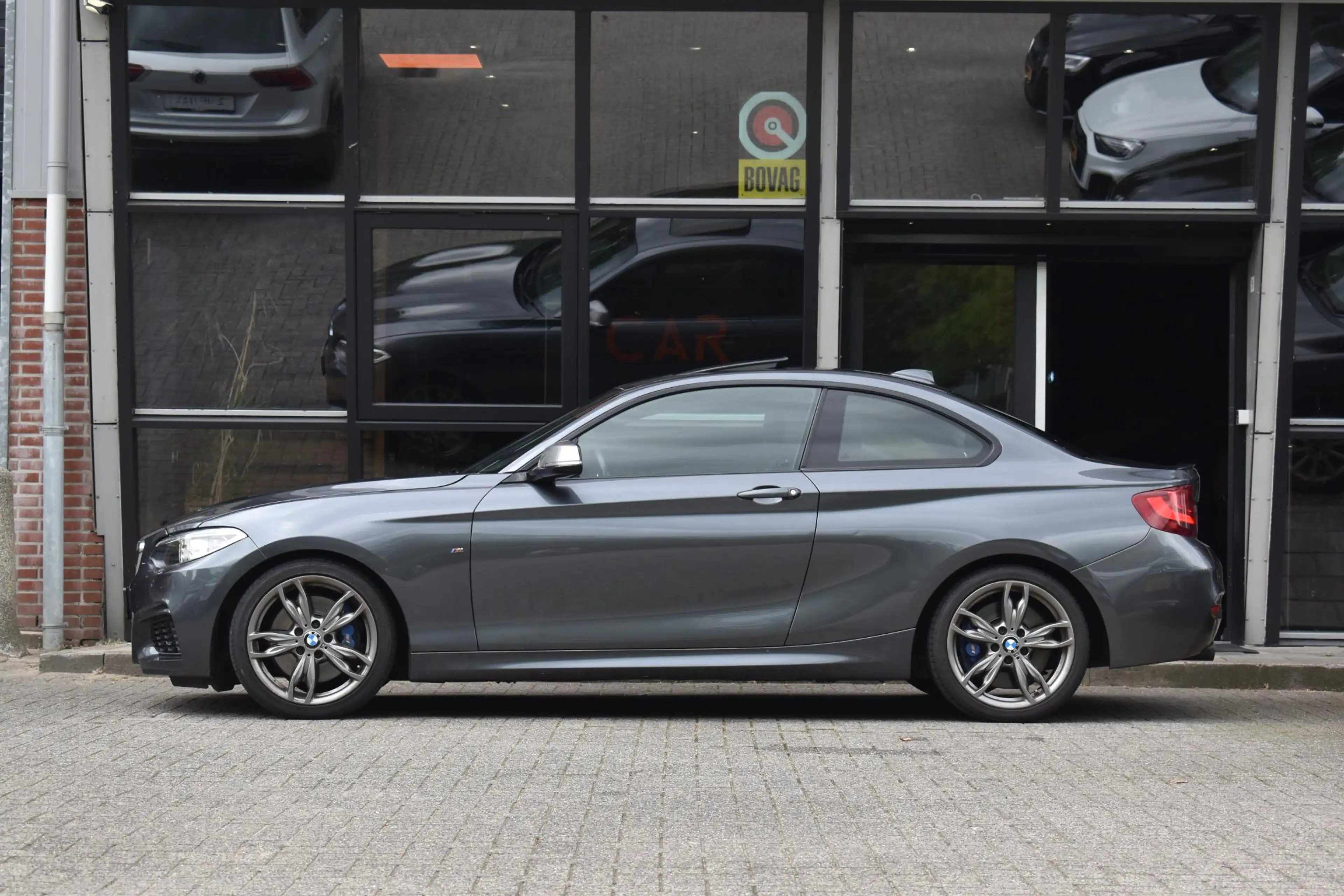 BMW 235 2-serie Coupé M235i High Executive Keyless Pano H/ — photo 4