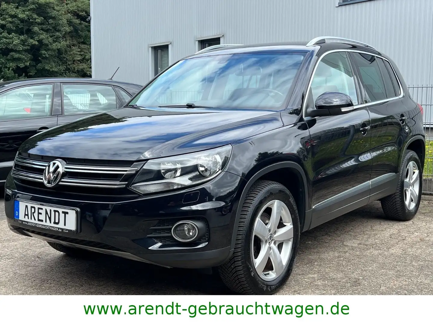 Volkswagen Tiguan Track & Style 4Motion*AHK/NAVI/PDC/SHZ* Schwarz - 1