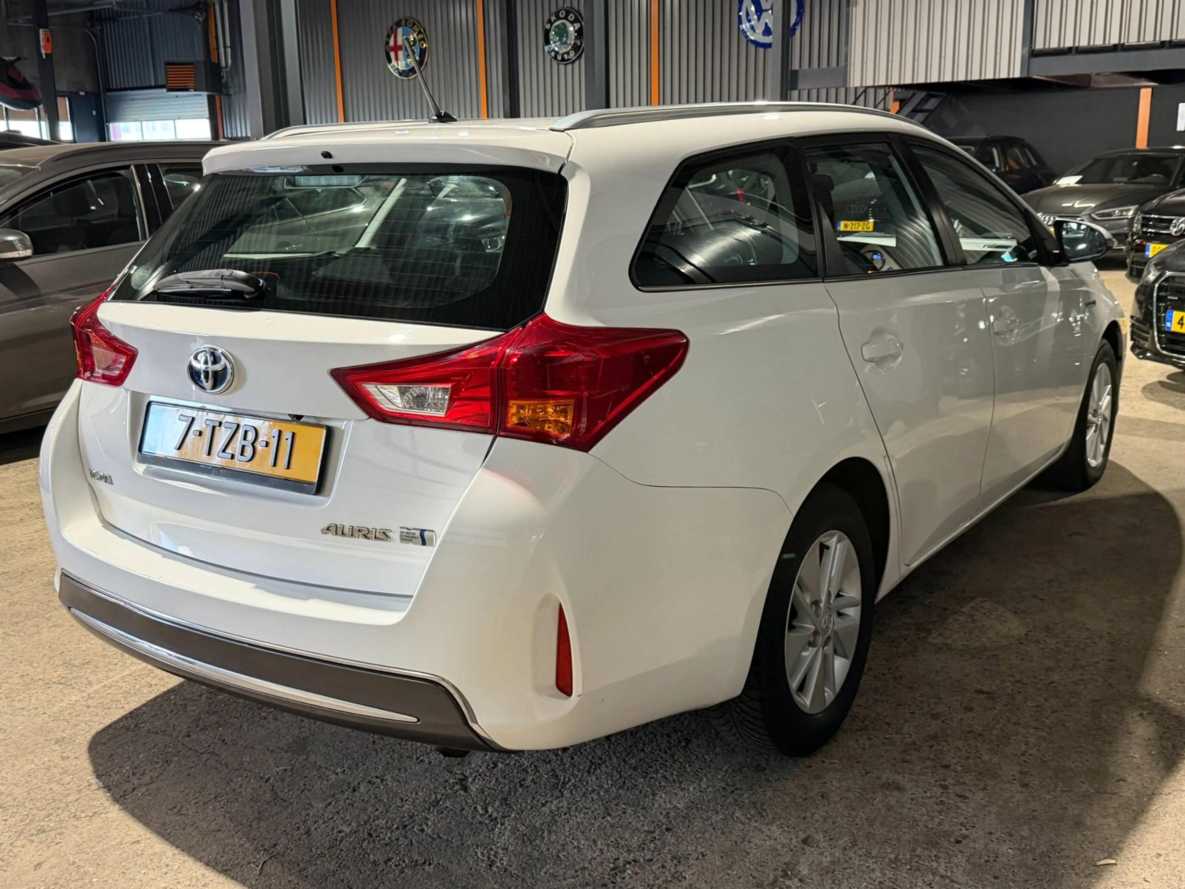Toyota Auris Touring Sports 1.8 Hybrid Aspiration Onderhouden C — photo 4