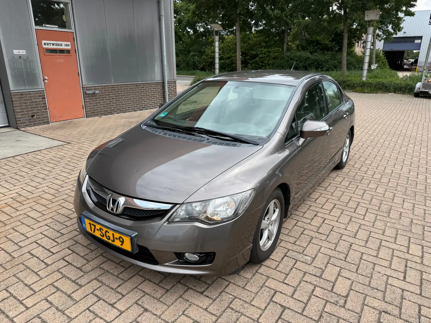 Honda Civic 1.3 Hybrid Elegance NAP CarPlay Bruin - 1