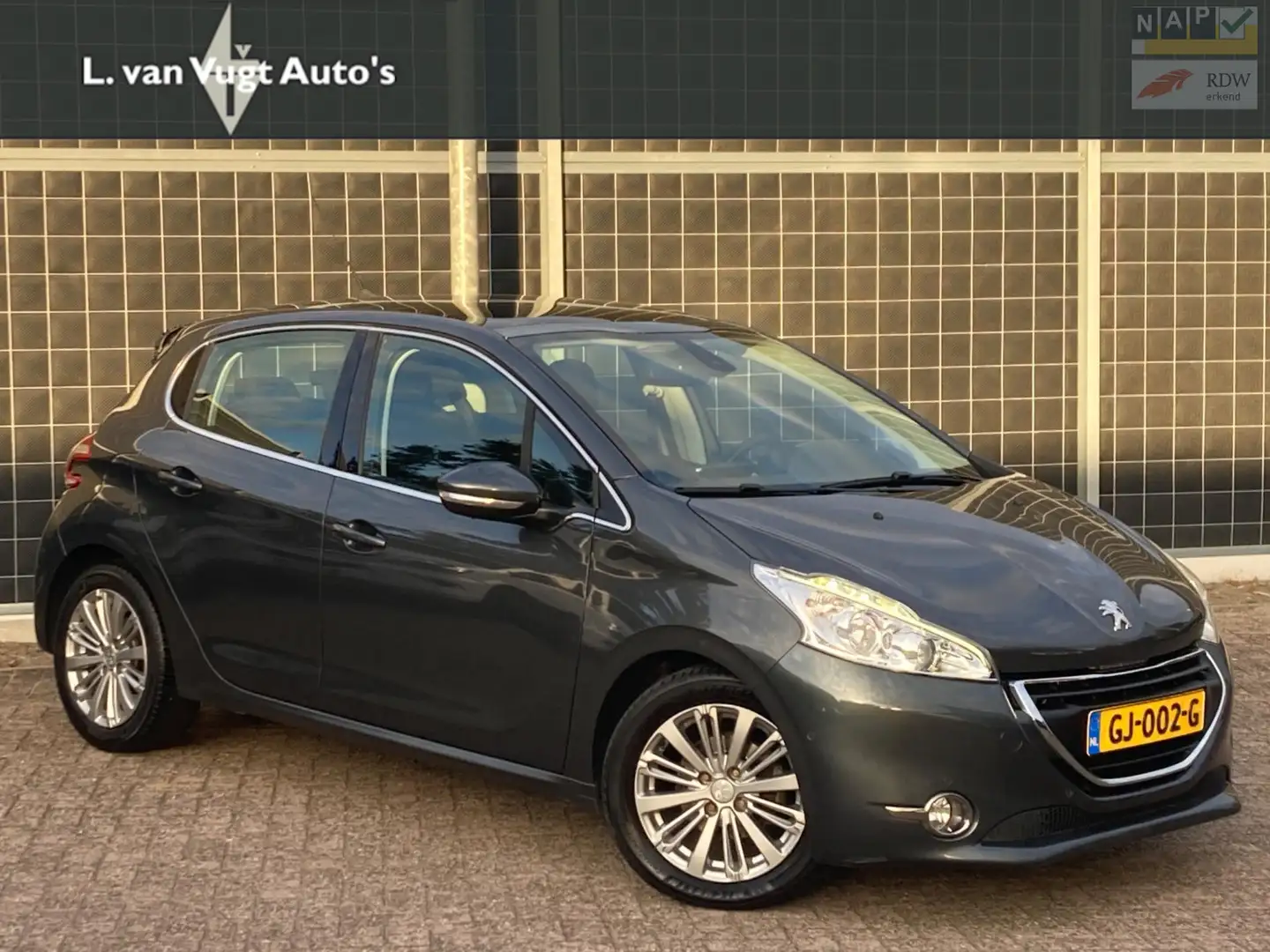 Peugeot 208 1.6 BlueHDi Blue Lease Premium Grijs - 1