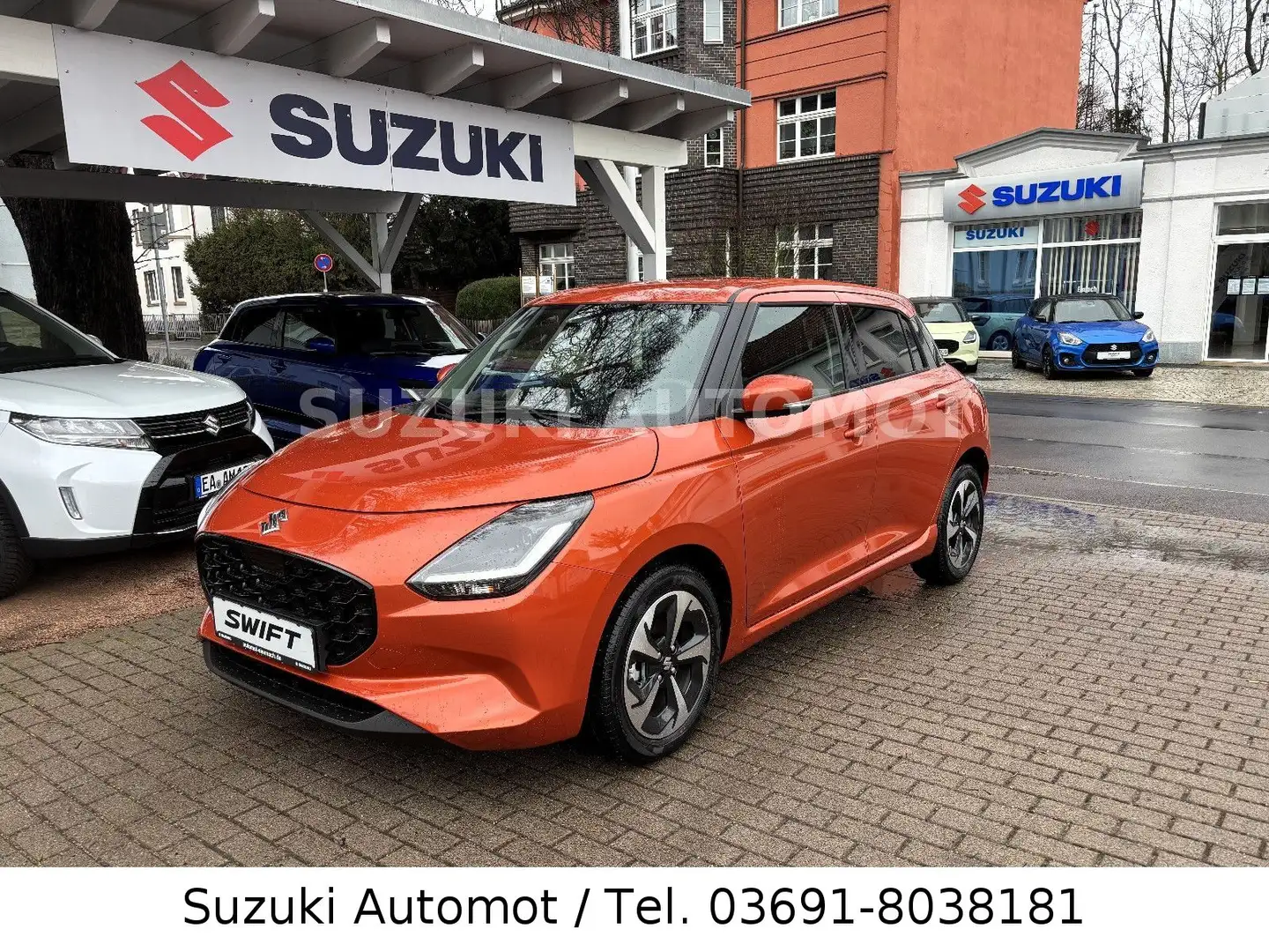 Suzuki Swift Hybrid Comfort+ LED Navi Assist RFK SHZ LM Orange - 1