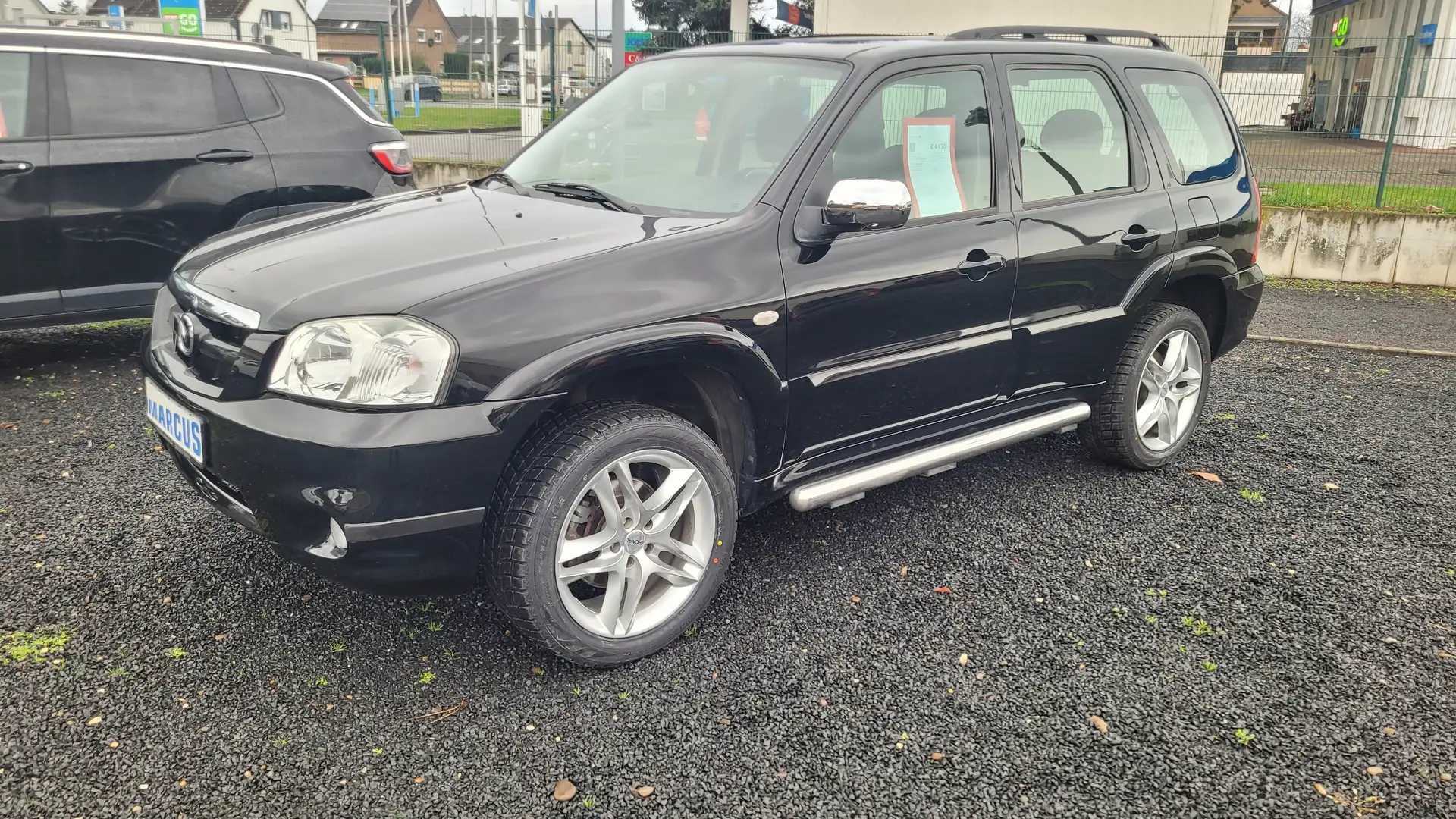 Mazda Tribute 2.3 Exclusive 4X4 Schwarz - 1