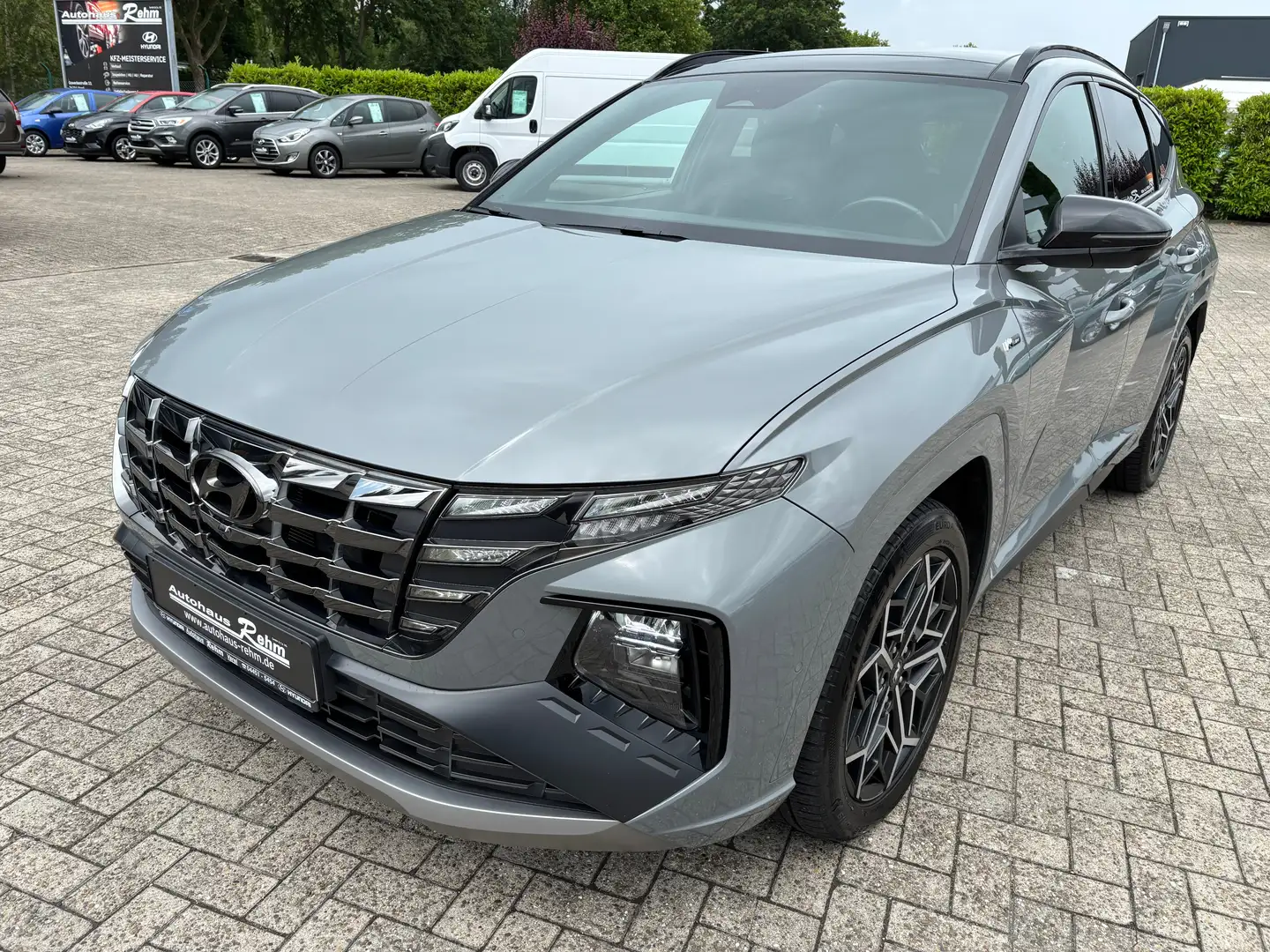 Hyundai TUCSON PHEV 1.6 T-GDI N-Line 4WD | AHK | Pano | Allwetter Grau - 1