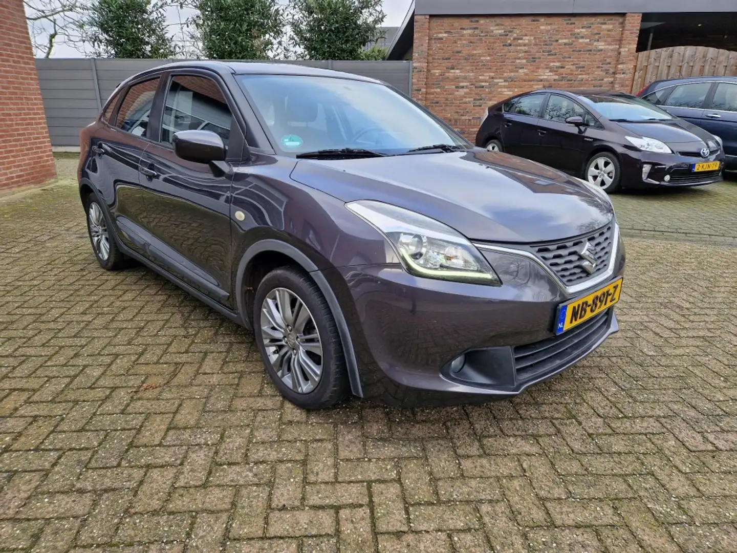 Suzuki Baleno 1.2 Exclusive 5-drs Airco NL-auto trekhaak Stoelve Gris - 2