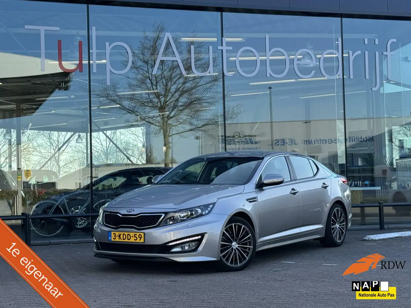 Kia Optima 2.0 CVVT Hybrid Plus Pack 2013 1e eig 61569km nap Grijs - 1