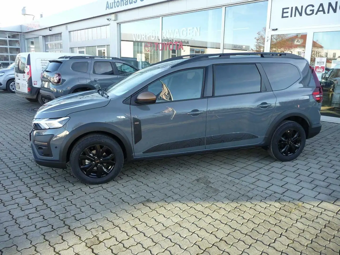 Dacia Jogger Extreme TCe110/5-Si.,Navi,Klimaautom.,SHZ,Kamera Grau - 1