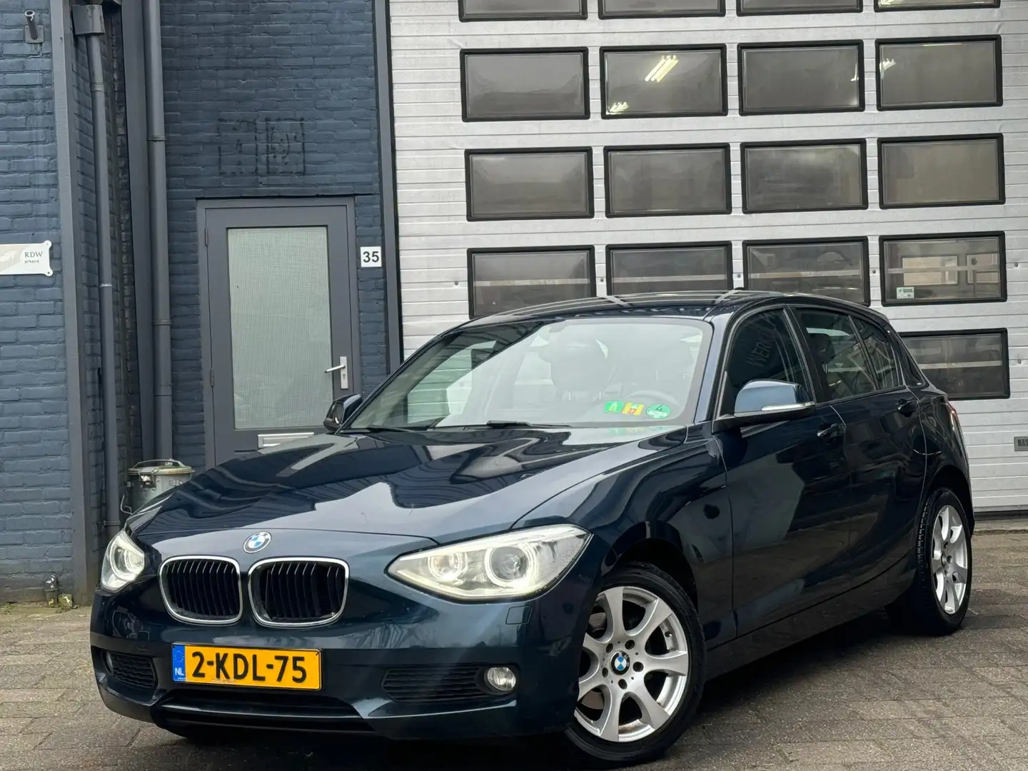 BMW 116 1-serie 116i Upgrade Edition | Airco | Leer | Xeno Blauw - 1