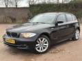BMW 116 1-serie 116i Corporate INCLUSIEF NIEUW DISTR.KETTI Schwarz - thumbnail 1