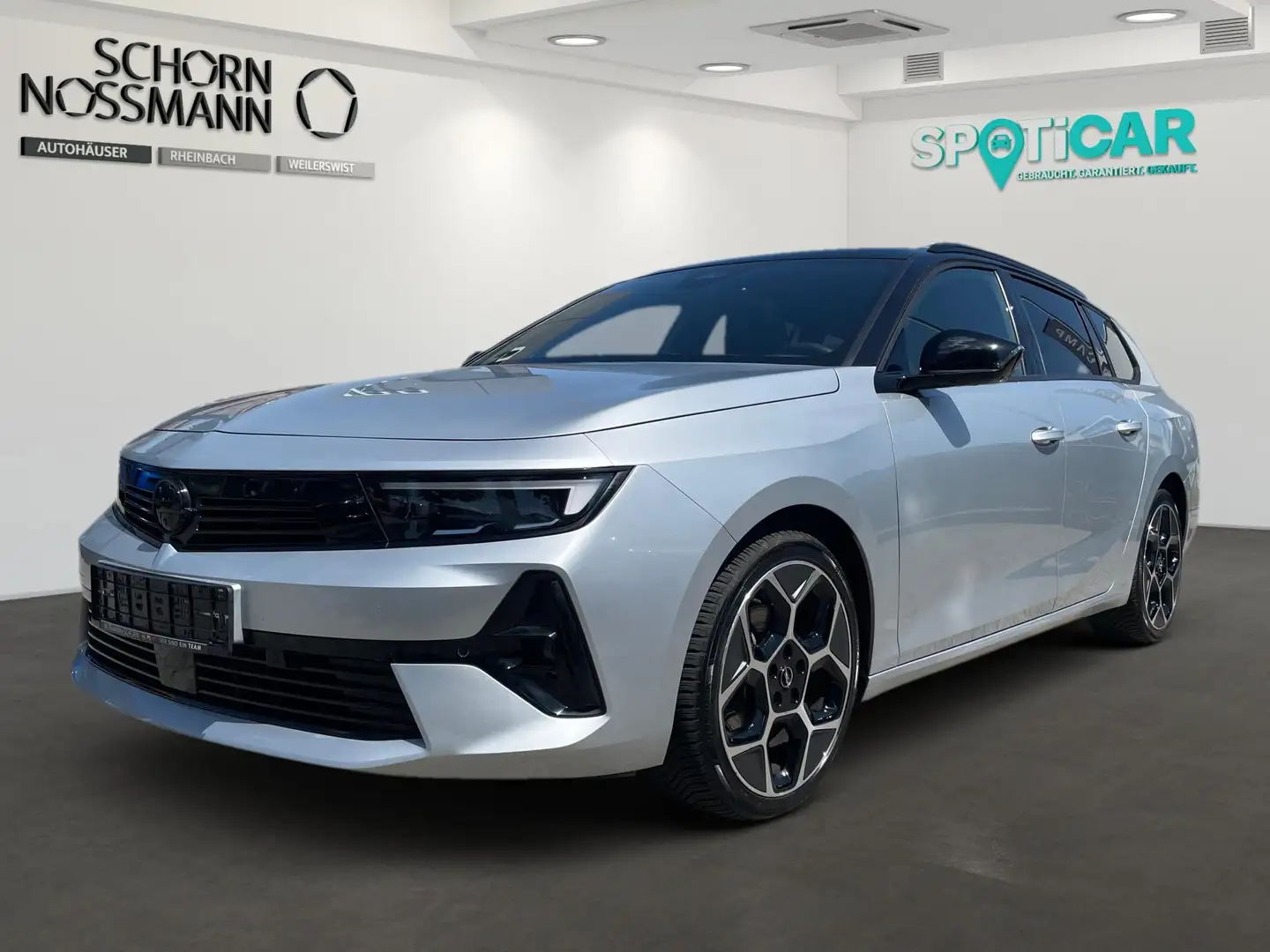 Opel Astra ASTRA L ST ULTIMATE 1.2T AT MATRIX-LED+MASSAGE+360 Silber - 1