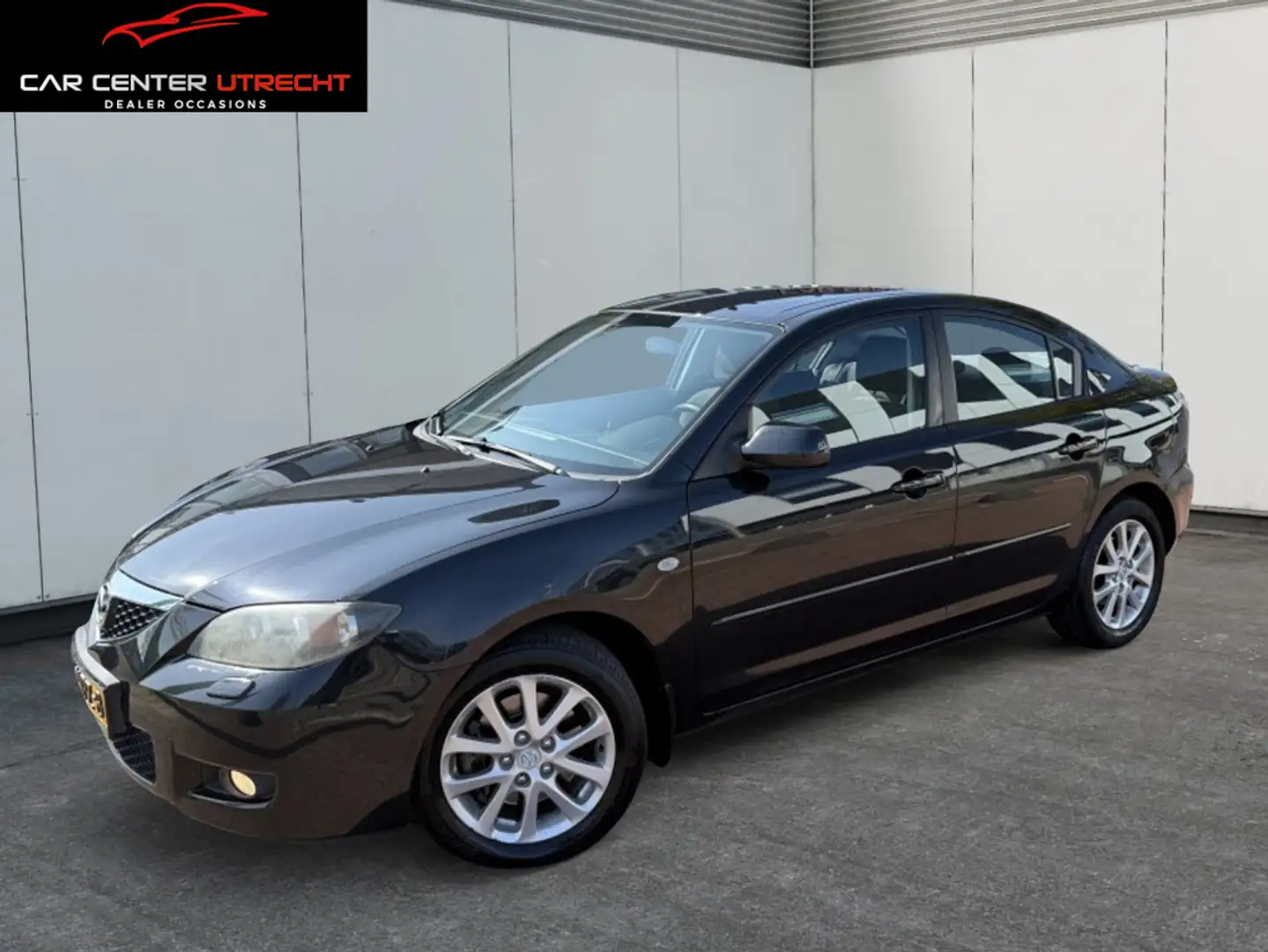 Mazda 3 2.0 DiSi TS Plus | navi | automaat | 4 deurs | Negro - 1