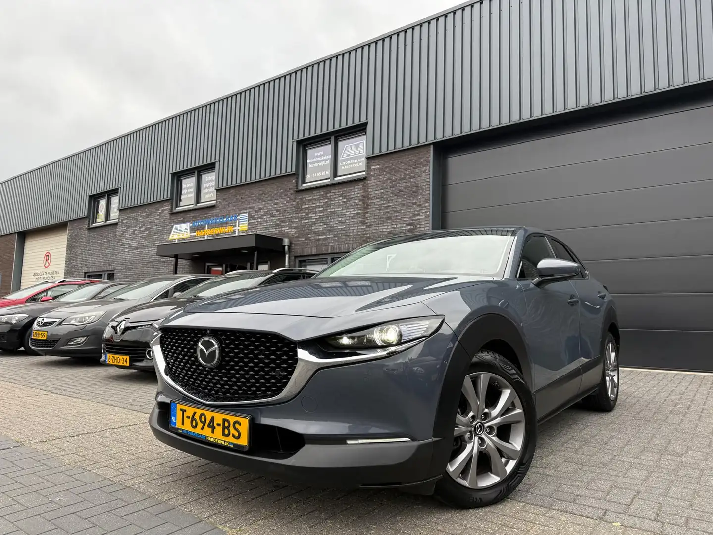 Mazda CX-30 2.0 e-SkyActiv-G M Hybrid | 1E EIGENAAR | 12MND GA Grau - 2