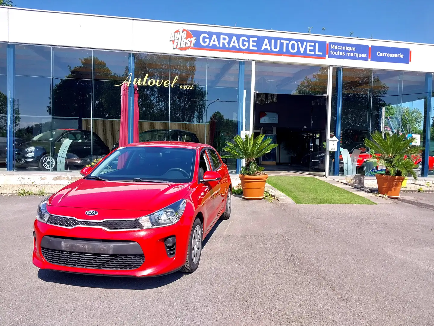 Kia Rio 1.2i Navi Edition Rouge - 1