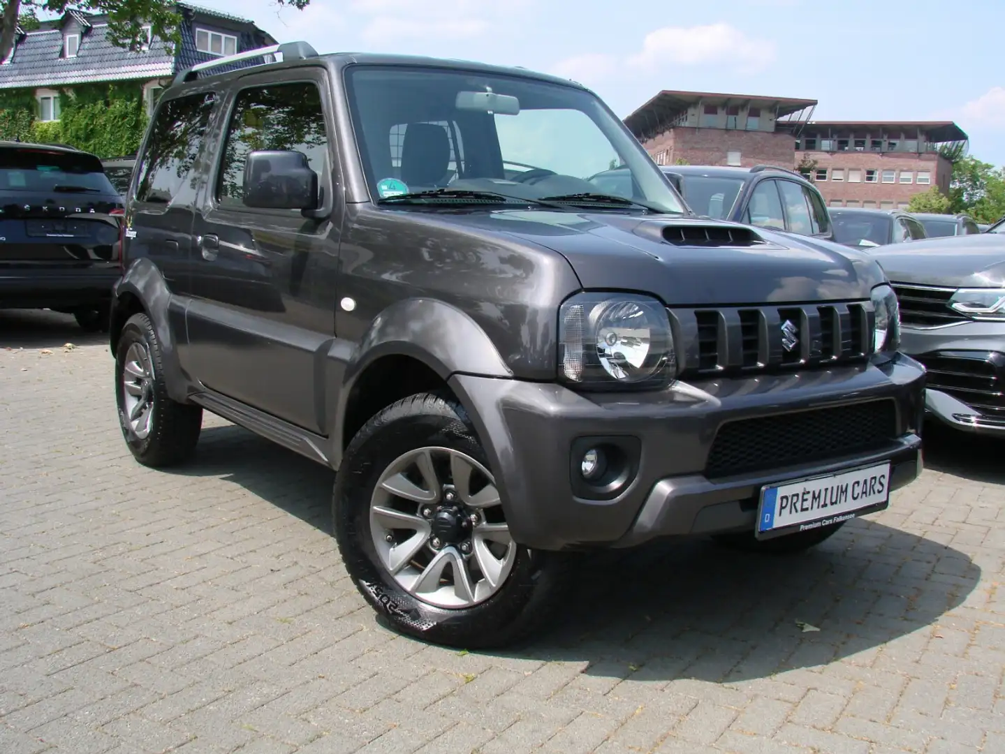 Suzuki Jimny Ranger 1.3 Allgrip Style Leder Klima AHK Gris - 1