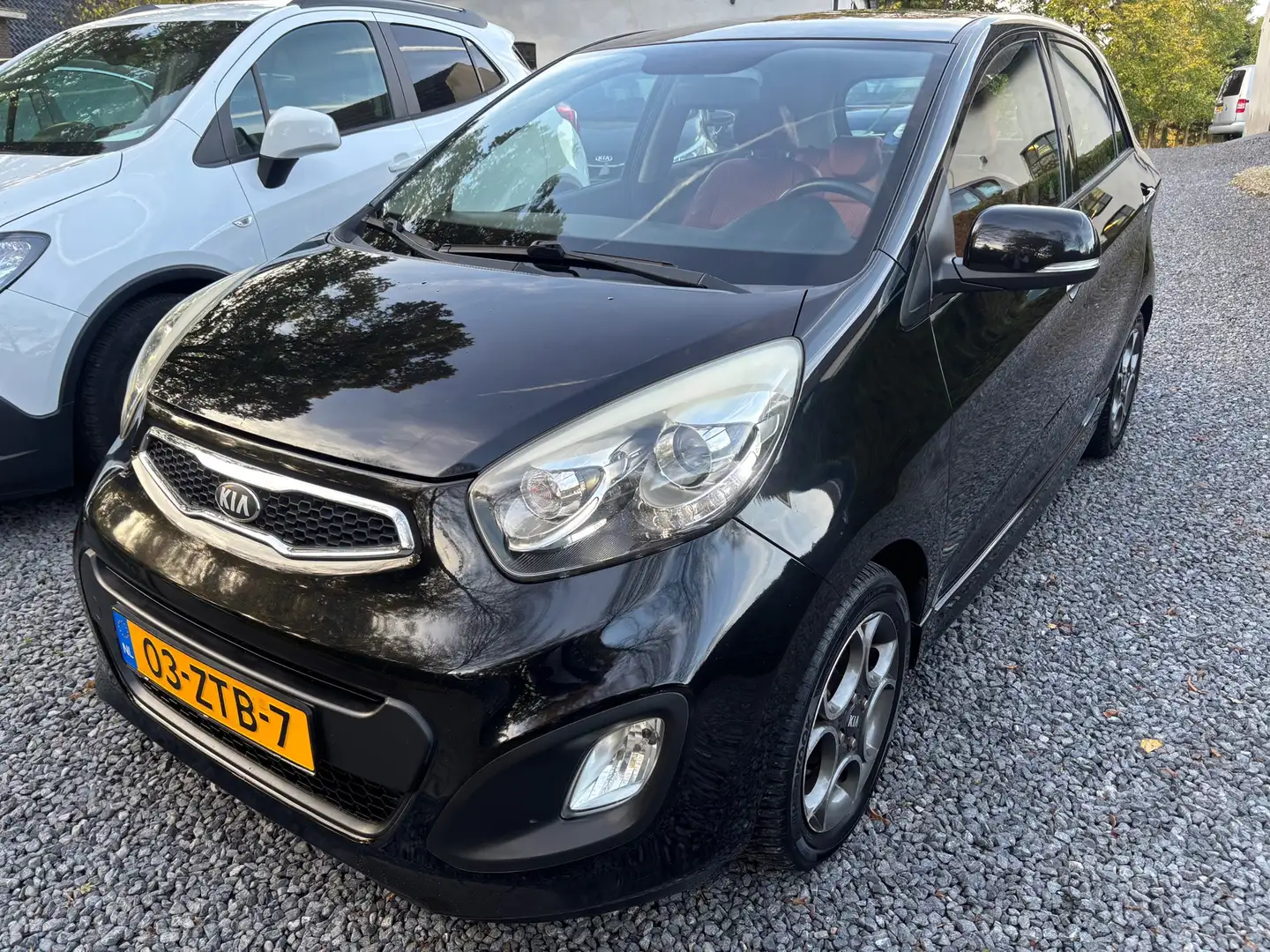 Kia Picanto 1.0 CVVT ISG Design Edition LEDER AIRCO Zwart - 1