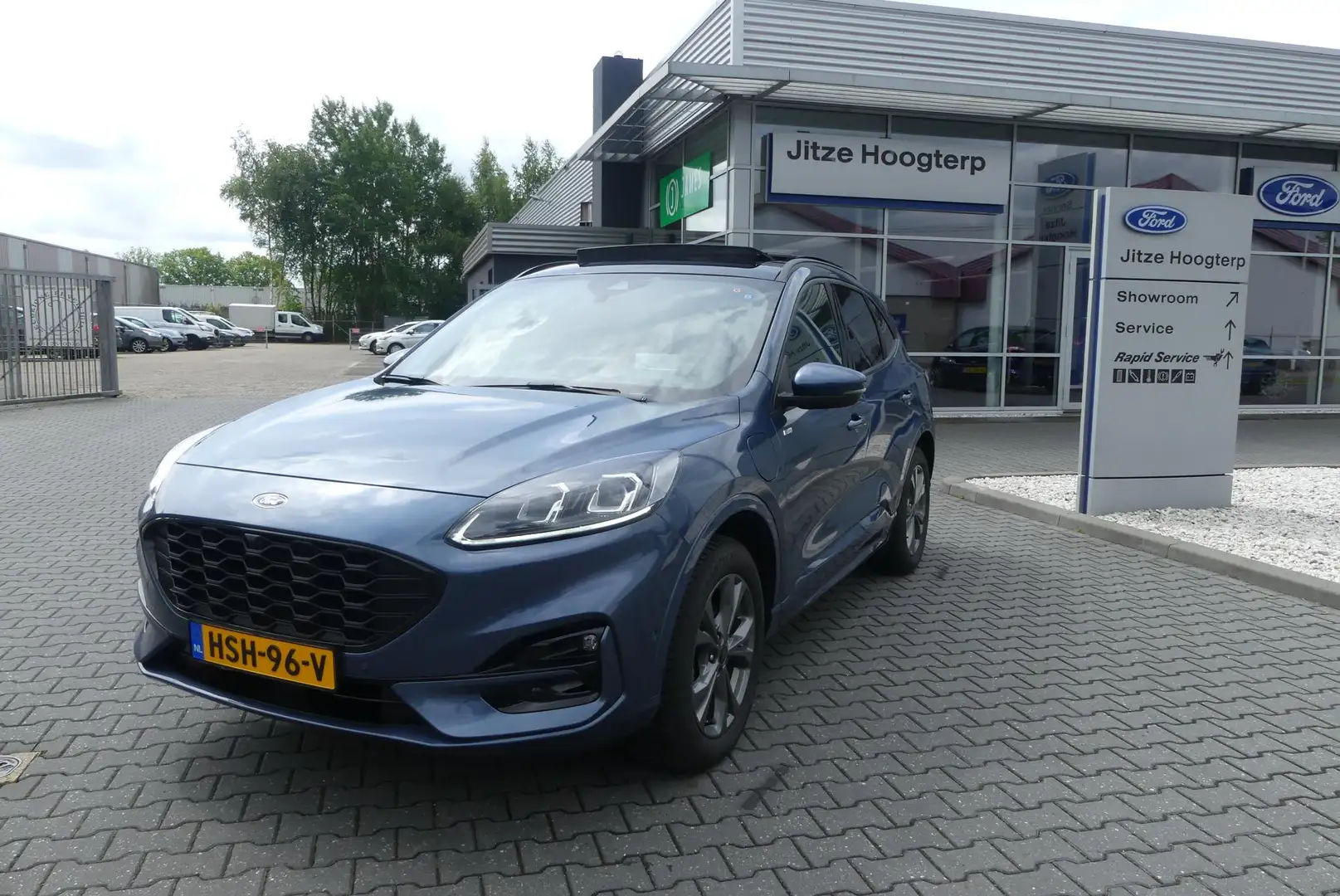 Ford Kuga 2.5 PHEV ST-Line X ADAPTIEVE CRUISE, CLIMA, NAVI, Blauw - 1