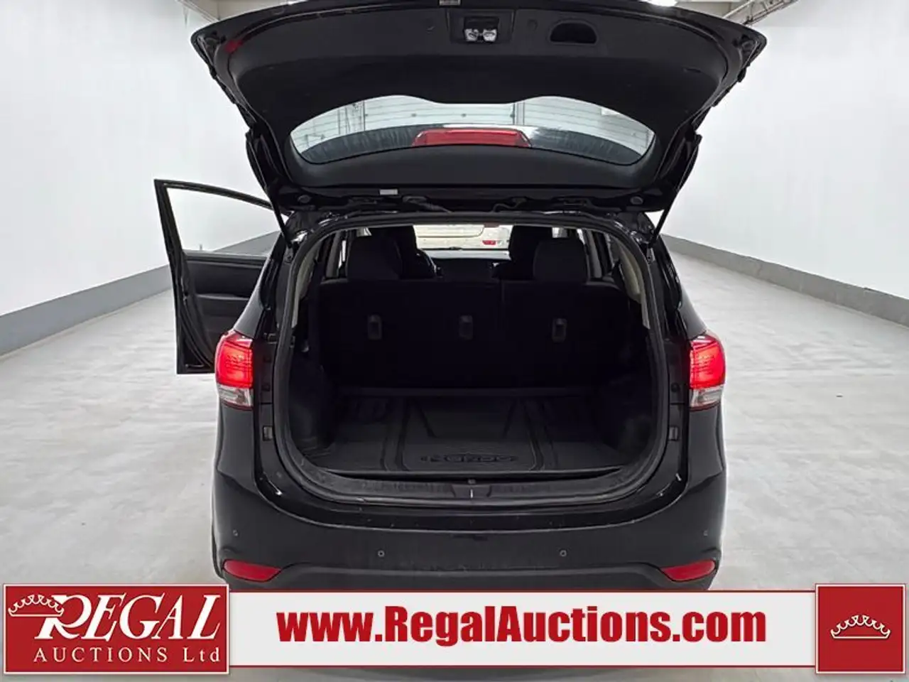 Kia Rondo снимка Kia Rondo