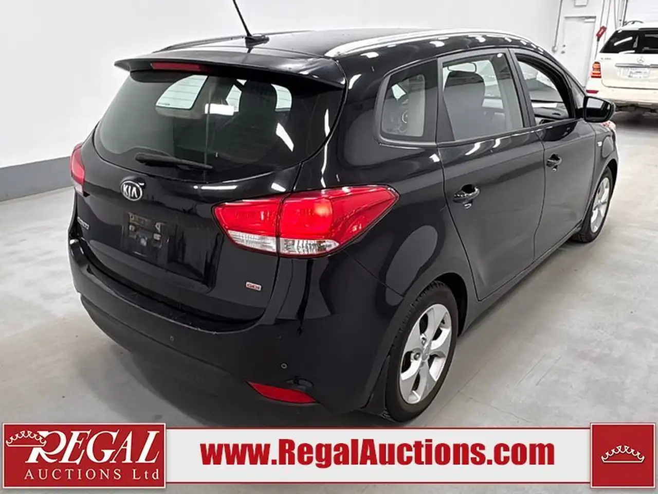 Kia Rondo снимка Kia Rondo
