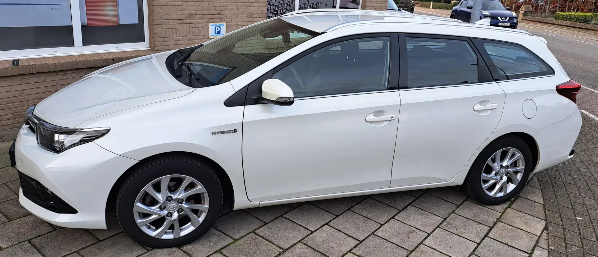 Toyota Auris Auris 1.8 VVT-i Hybrid Automatik Touring Sport Wit - 1