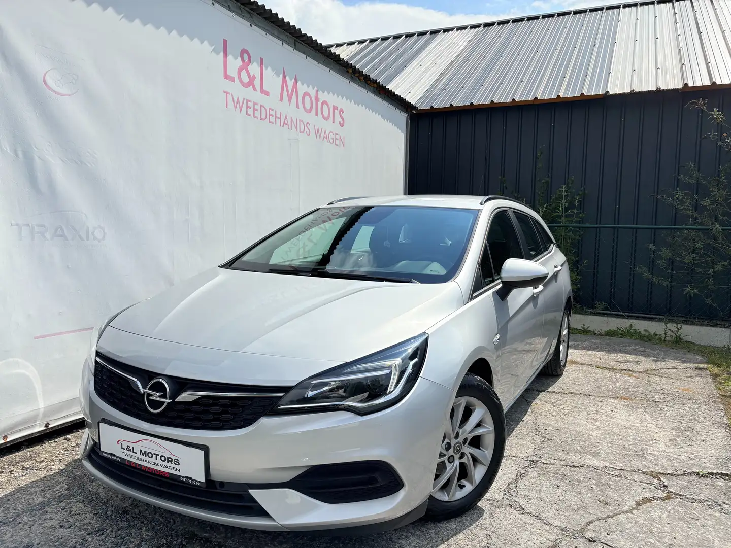 Opel Astra Sports Tourer 1.5 Turbo D Edition 12Maand Garantie Argent - 1