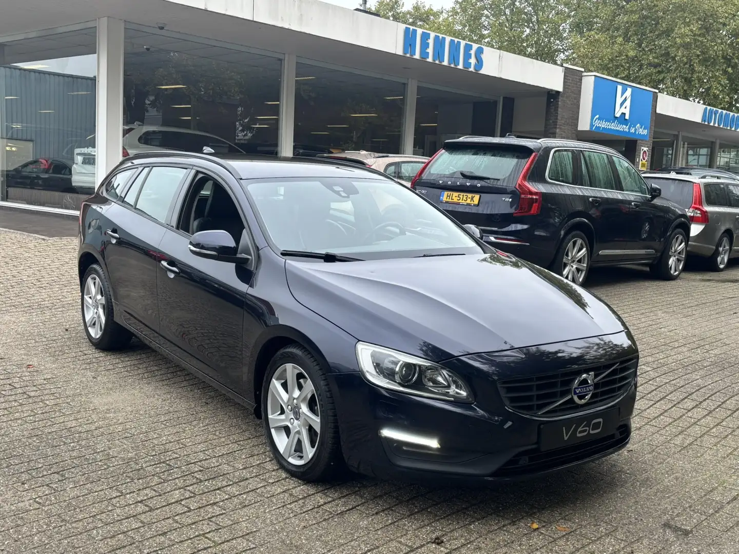 Volvo V60 2.0 T5 245pk Aut8 Xenon Navi PDC V+A Leder Blau - 1