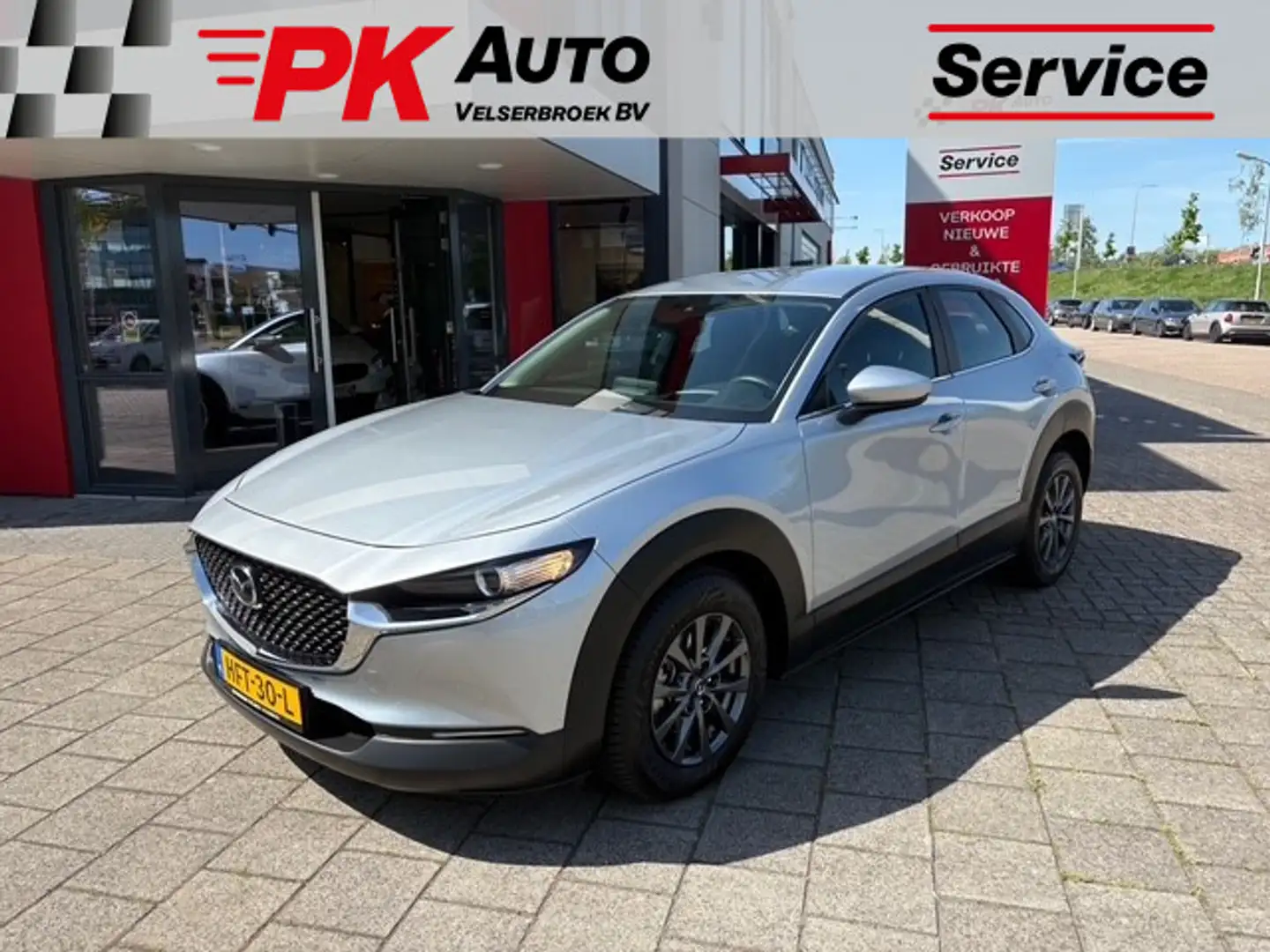 Mazda CX-30 2.0 e-SkyActiv-G M Hybrid | Navi | Trekhaak | 20.3 Grijs - 1