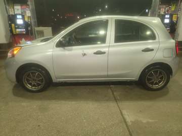 HATCHBACK,GOLD WHEELS,5 SPEED