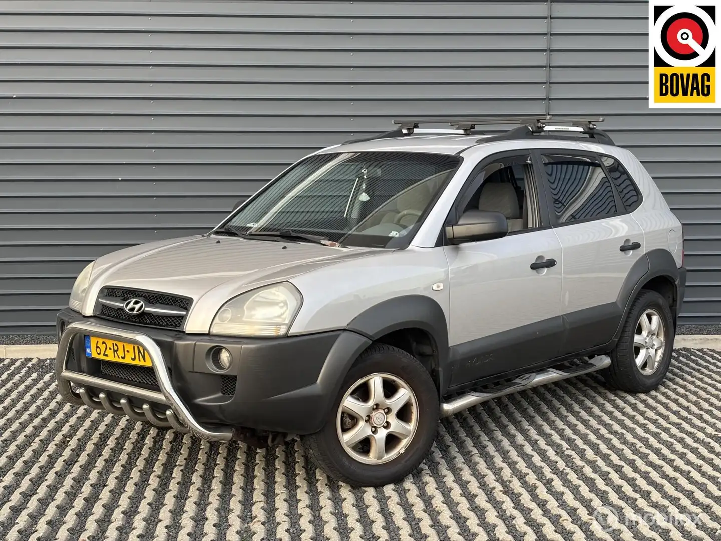 Hyundai TUCSON 2.0i Active 142 pk | Airco | Trekhaak | Gris - 1