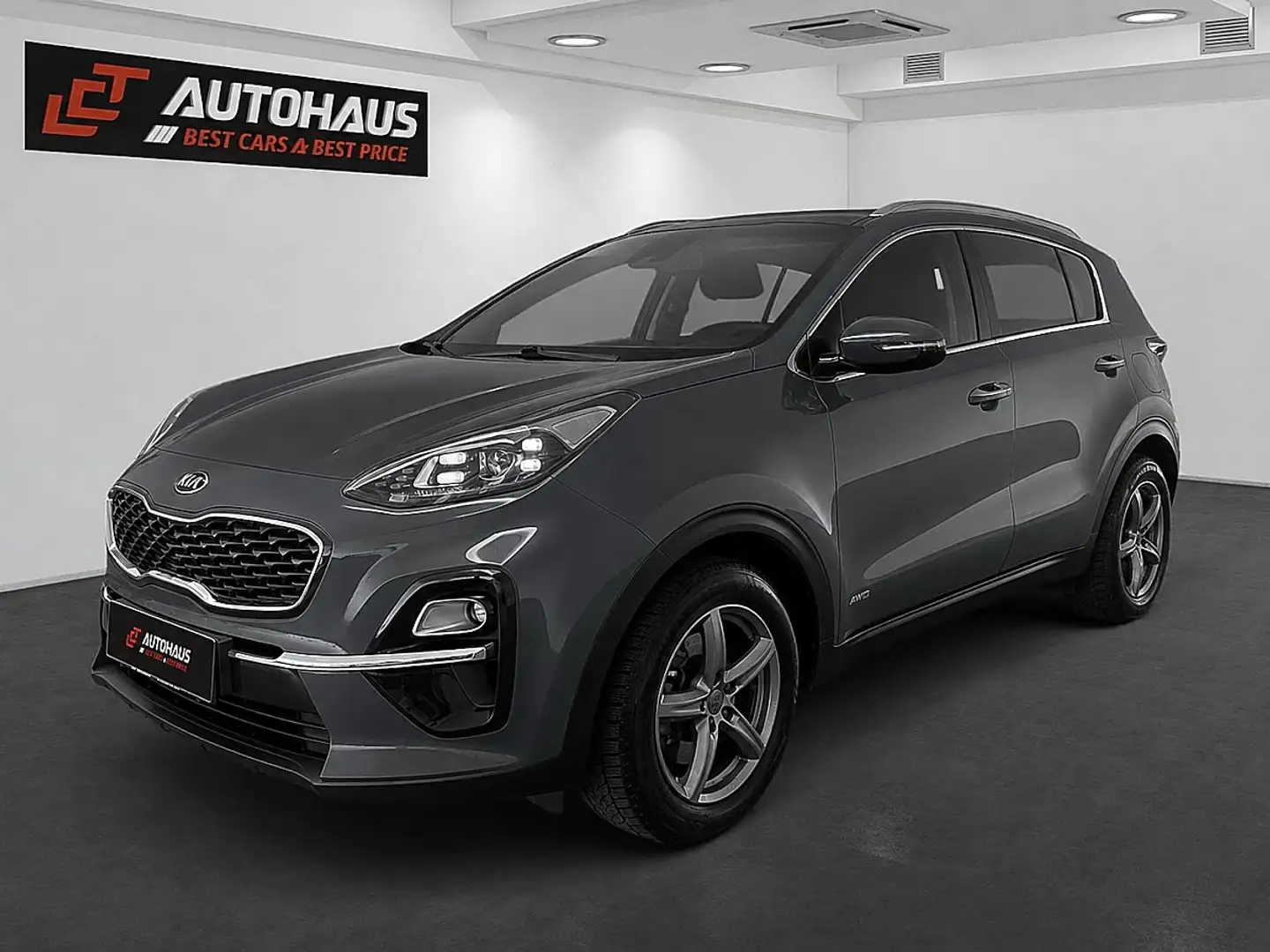 Kia Sportage 1,6 T-GDI AWD First Edition DCT Aut. | 1.BESITZ | Grau - 1