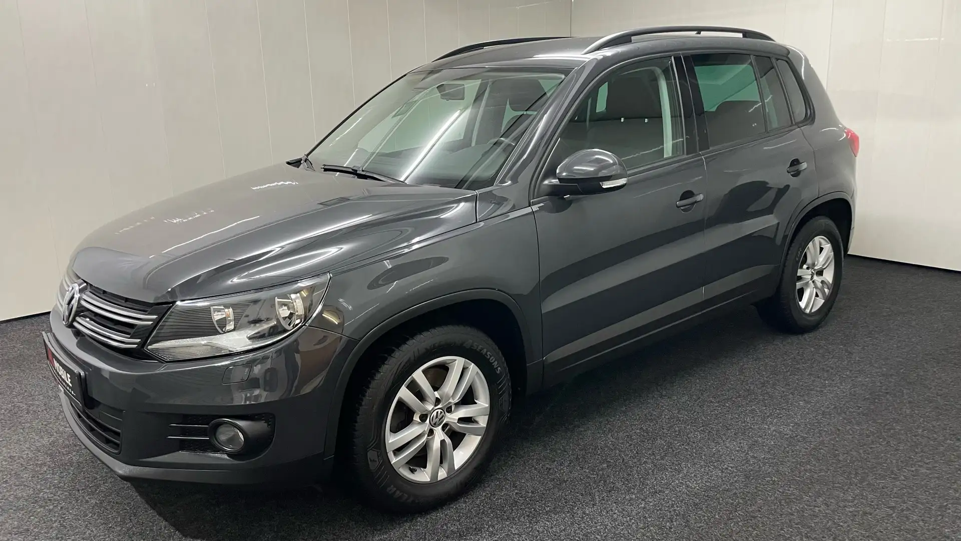 Volkswagen Tiguan Trend 1.4 TSI SHZ NAVI PDC TEMP AHK SCHECKH TÜV Grau - 1
