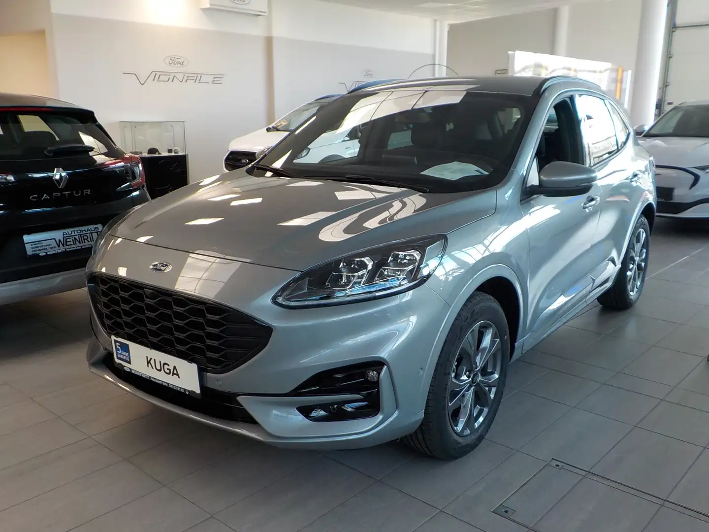 Ford Kuga 2.5 Duratec FHEV AWD ST-Line X Aut. Silber - 1