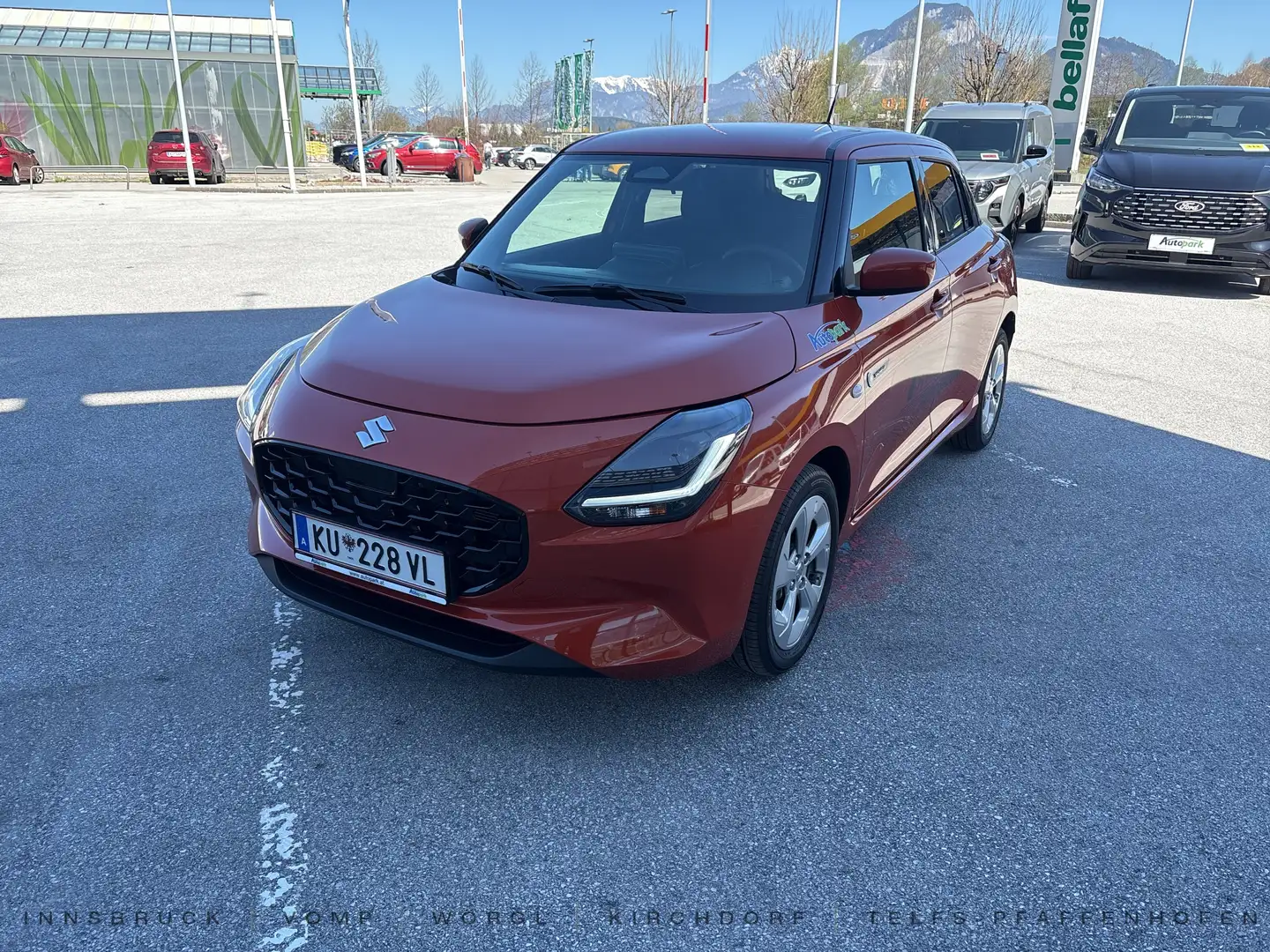 Suzuki Swift 1.2 HYBRID shine Orange - 1