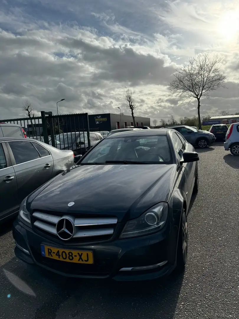 Mercedes-Benz C 220 2.2 CDI Coupe AUT Leder Memory Xenon Zwart - 1