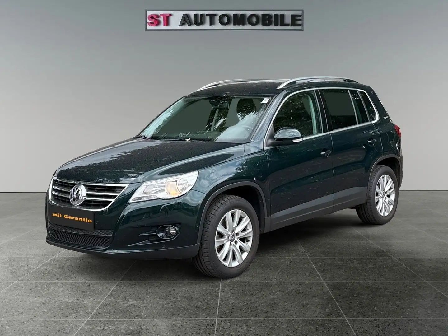 Volkswagen Tiguan Team 4Motion 1.4-Navi-8 Fach Bereift-PDC Grün - 1