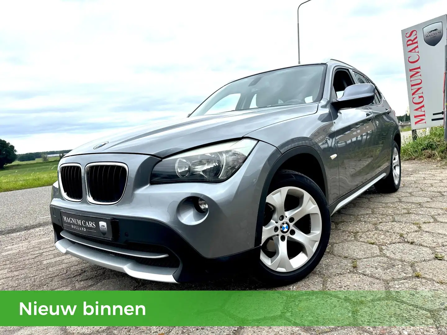 BMW X1 18i NAP NL AUTO| AIRCO| TREKHAAK| NIEUWE APK| VELG Grau - 1