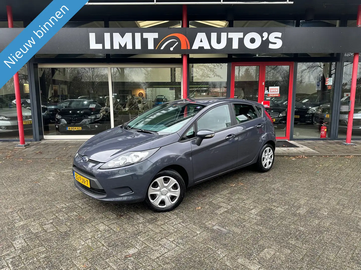 Ford Fiesta 1.25 Limited Airco/El.ramen/5drs/Nap/Apk Grijs - 1