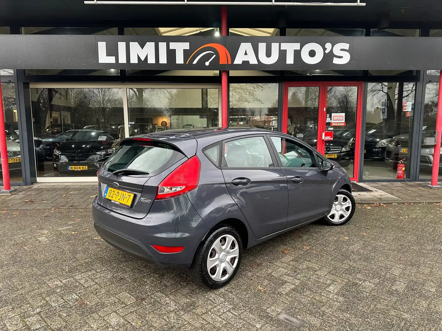 Ford Fiesta 1.25 Limited Airco/El.ramen/5drs/Nap/Apk Grijs - 2