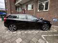 Volvo V60 2.4 D6 AWD hybrid pano full options export Zwart - thumbnail 1