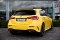 Mercedes-Benz A 180 7G-DCT AMG Line -LED-CAMERA-CARPLAY-CRUISE-AMBIANT Geel - thumbnail 9