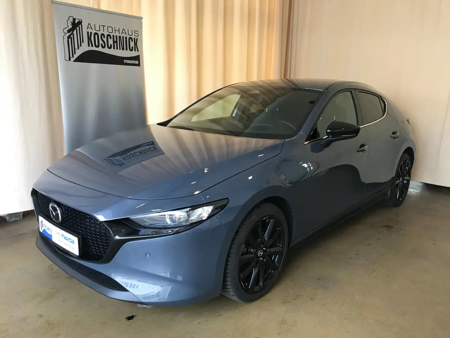 Mazda 3 2.0L e-SKYACTIV X 186 6AT HOMURA Gris - 1