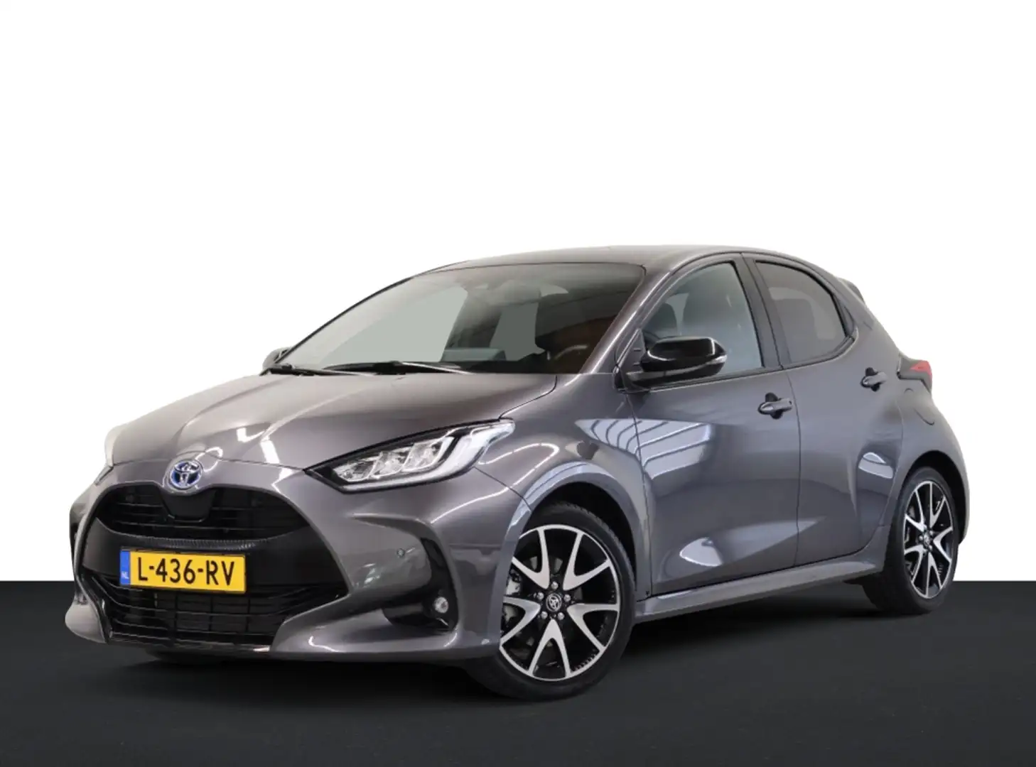 Toyota Yaris 1.5 Hybrid Executive Grijs - 1